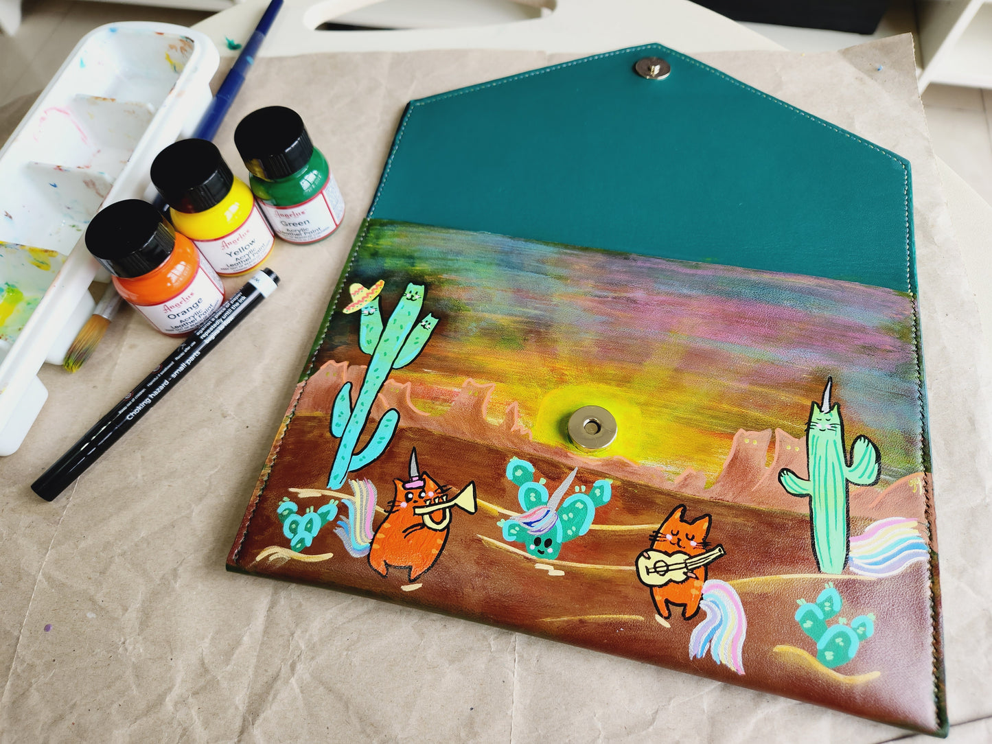 Custom painting of personal pouches